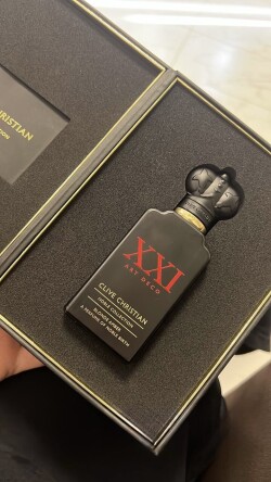 XXI