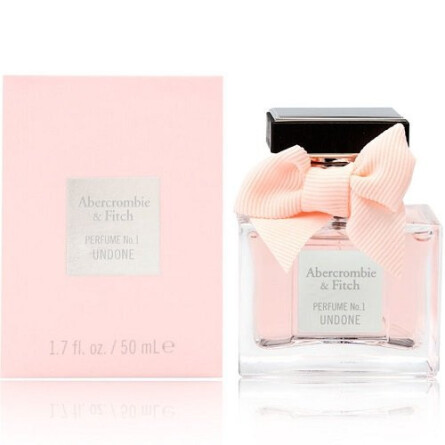 candies perfume orange bottle